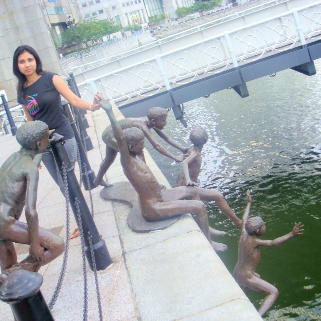 Singapore River Tour Sculpture Kids Jumping into the Water 